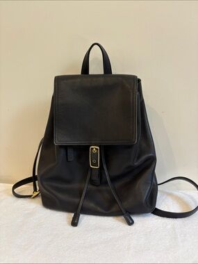 Vintage Coach Black Leather Drawstring Backpack with Gold-Tone Accent